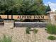 A landscaped sign welcomes you to Alpers Farm at 6358 S Miller Way, Littleton, CO 80127