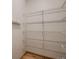 Pantry with wire shelving and wood floors at 6358 S Miller Way, Littleton, CO 80127