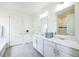 Bathroom with double vanity, shower, and tile floor at 1680 Rivergate Way, Berthoud, CO 80513