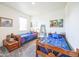 Bedroom with twin beds, wood furniture, and carpet flooring at 1680 Rivergate Way, Berthoud, CO 80513