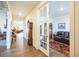 Bright entryway with hardwood floors and views to living areas at 1680 Rivergate Way, Berthoud, CO 80513
