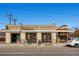 Inviting restaurant exterior with ample outdoor seating, visible signage, and an open facade at 100 Park W Ave # 201, Denver, CO 80205