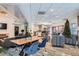 Spacious lounge area featuring contemporary furniture, a cozy sitting area, and a festive Christmas tree at 100 Park W Ave # 201, Denver, CO 80205
