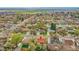 House in quiet neighborhood with mature trees, grass and private parking at 6990 Larsh Dr, Denver, CO 80221