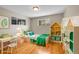 Charming room with cheerful decor, cozy bed, and a playful bookshelf at 6990 Larsh Dr, Denver, CO 80221