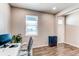Office space with hardwood flooring, a large window, and an office setup at 13921 Scarlet Sage Ln, Parker, CO 80134