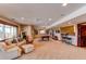 Basement featuring a pool table, bar area, and comfortable seating, perfect for entertaining guests at 8682 N Sundown Trl, Parker, CO 80134