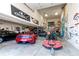 Spacious garage with multiple cars, and a basketball hoop at 8682 N Sundown Trl, Parker, CO 80134