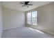 Bedroom featuring neutral walls, carpet and a window with natural light at 4361 Kirk Ct, Denver, CO 80249