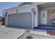Charming single-Gathering home with a two-car garage, covered porch, and well-maintained landscaping at 4361 Kirk Ct, Denver, CO 80249