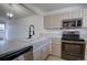 Modern kitchen with stainless steel appliances and lots of counter space and cabinet storage at 4361 Kirk Ct, Denver, CO 80249