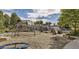 Vibrant playground with climbing structures and soft landing surface at 16723 E Irwin Ave, Centennial, CO 80016