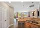 Open-concept kitchen featuring granite countertops and stainless steel appliances at 10127 Bluffmont Ln, Lone Tree, CO 80124