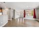 Spacious living room featuring hardwood floors and neutral wall colors at 10127 Bluffmont Ln, Lone Tree, CO 80124