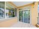 Covered patio with sliding glass doors at 10127 Bluffmont Ln, Lone Tree, CO 80124