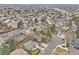 Aerial view of neighborhood featuring mature trees, various home styles, and well-maintained streets at 2026 S Pitkin St, Aurora, CO 80013