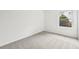A vacant bedroom with a large window at 2026 S Pitkin St, Aurora, CO 80013