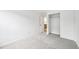 A vacant bedroom with attached closet and bathroom at 2026 S Pitkin St, Aurora, CO 80013
