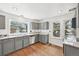 Bright kitchen with granite countertops, stainless steel appliances, and ample natural light at 2026 S Pitkin St, Aurora, CO 80013