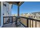 Balcony area with a grill and views of the neighborhood at 2052 Alcott Way, Broomfield, CO 80023