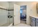 Bathroom featuring a glass-enclosed shower and modern fixtures, seamlessly connected to the bedroom at 2052 Alcott Way, Broomfield, CO 80023