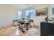 Cozy dining area with comfortable bench seating and a charming, round table at 2052 Alcott Way, Broomfield, CO 80023