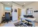 Well-lit home office with modern desk and decor, perfect for working remotely at 2052 Alcott Way, Broomfield, CO 80023
