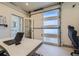 Well-lit home office with modern desk and decor, perfect for working remotely at 2052 Alcott Way, Broomfield, CO 80023