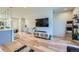 Open floor plan features a stylish console and a decorative ladder with blankets at 2052 Alcott Way, Broomfield, CO 80023