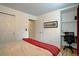 Bedroom with hardwood floors, work space, neutral walls, and good light at 20113 Edinborough Ct, Parker, CO 80138