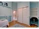 Bedroom with hardwood floors, double closets, and light blue walls at 20113 Edinborough Ct, Parker, CO 80138