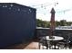 Charming rooftop deck with outdoor seating and string lights, perfect for entertaining at 701 E 24Th Ave, Denver, CO 80205