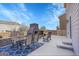 Spacious patio featuring a stone fireplace and an outdoor dining area at 1628 Taos St, Brighton, CO 80603