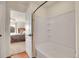 En-suite bathroom with a shower-tub combo, stylish finishes, and open to the main bedroom at 1628 Taos St, Brighton, CO 80603