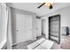 Bedroom featuring a closet with sliding doors, ceiling fan, and natural light at 1628 Taos St, Brighton, CO 80603