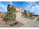 Attractive two-story home with a spacious driveway, inviting curb appeal, and lush front lawn at 1628 Taos St, Brighton, CO 80603