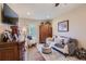 Comfortable living area with hardwood floors, stylish furnishings, and an inviting atmosphere at 164 W Acoma Dr, Littleton, CO 80120