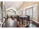 Open-concept living room with a dining area and plenty of natural light at 1642 S Trenton St, Denver, CO 80231