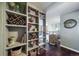 Built-in shelves offer ample storage in this charming home at 7700 W Glasgow Pl # 19C, Littleton, CO 80128