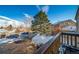 Deck overlooks parking lot and surrounding neighborhood at 7700 W Glasgow Pl # 19C, Littleton, CO 80128