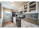 Well-equipped kitchen boasting modern appliances and ample cabinet space at 7700 W Glasgow Pl # 19C, Littleton, CO 80128