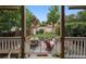 Back porch area with outdoor seating and access to a beautifully landscaped backyard at 1007 N Ogden St, Denver, CO 80218