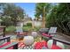 Charming outdoor space with a patio, seating area, and lush landscaping at 1007 N Ogden St, Denver, CO 80218