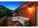 Stylish balcony with comfortable sectional sofa and decorative pillows, perfect for relaxing outdoors at 1007 N Ogden St, Denver, CO 80218