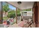 Outdoor deck with comfortable chairs and a view of the landscaped backyard at 1007 N Ogden St, Denver, CO 80218