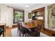 Formal dining room with a wooden table set and a classic built-in cabinet at 1007 N Ogden St, Denver, CO 80218