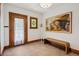 Entryway with tiled floors, bench seating, and front door with stained glass window at 1007 N Ogden St, Denver, CO 80218