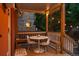 Inviting covered patio featuring string lights, seating, and an outdoor dining area perfect for relaxation and entertaining at 1007 N Ogden St, Denver, CO 80218