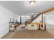 Spacious basement featuring stairs, ample storage, and potential for customized living space at 8600 S Warhawk Rd, Conifer, CO 80433