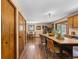 Spacious kitchen with long island, lots of seating, and access to a dining area at 8600 S Warhawk Rd, Conifer, CO 80433